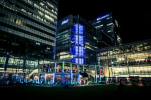 AI technology enhancing tax advisory services at KPMG UK, with digital data analytics visuals and business professionals collaborating on tax strategy