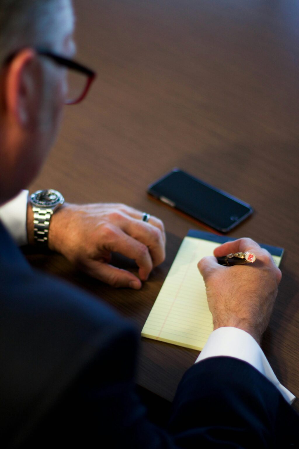 Corporate finance professionals analyzing technology deals and mergers in the business sector.