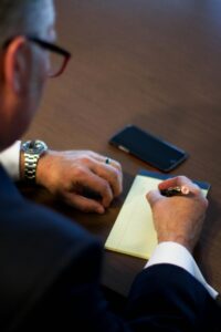 Corporate finance professionals analyzing technology deals and mergers in the business sector.