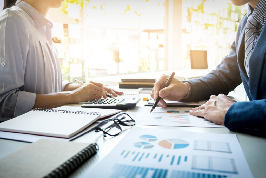 Accountants using technology tools in an office environment