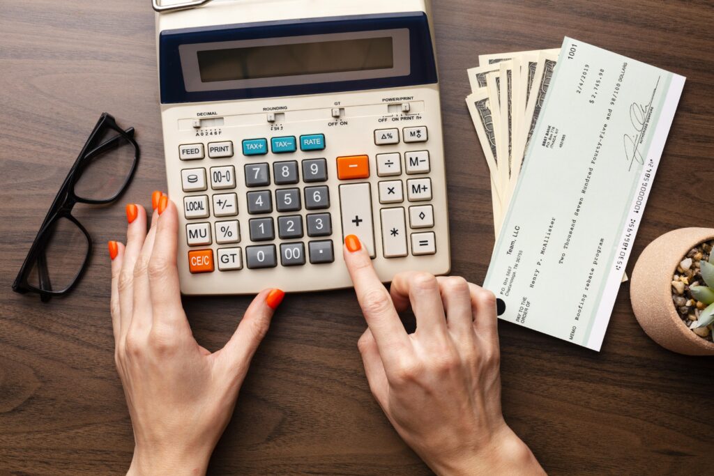 Future of payroll: UK payroll professional reviewing AI-automated payslips and payroll reports