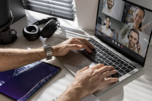 Professionals performing remote accounting with cloud-based tools, sharing reports, and communicating virtually.