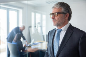 AI-powered CFO reviewing real-time financial analytics and predictive forecasting on digital dashboard